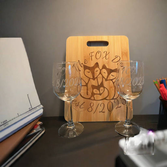 Engraved cutting board and 2 wine glasses